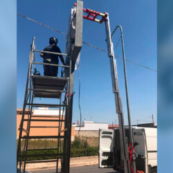 Installing of posters on poles